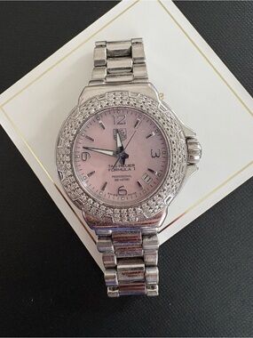 TAG Heuer Formula 1 Lady quartz watch featuring a diamond bezel and a pink dial